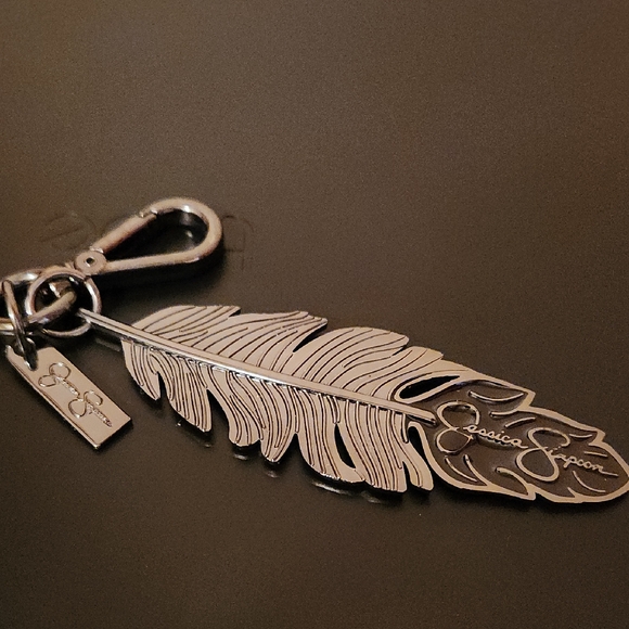 Jessica Simpson Accessories - Jessica Simpson Silver And Black Feather Keychain Or Purse Charm